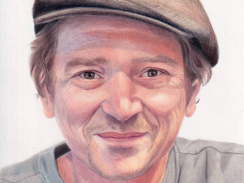Portrait d'homme aux crayons de couleur réalisé par l'artiste Laurie Sénacq